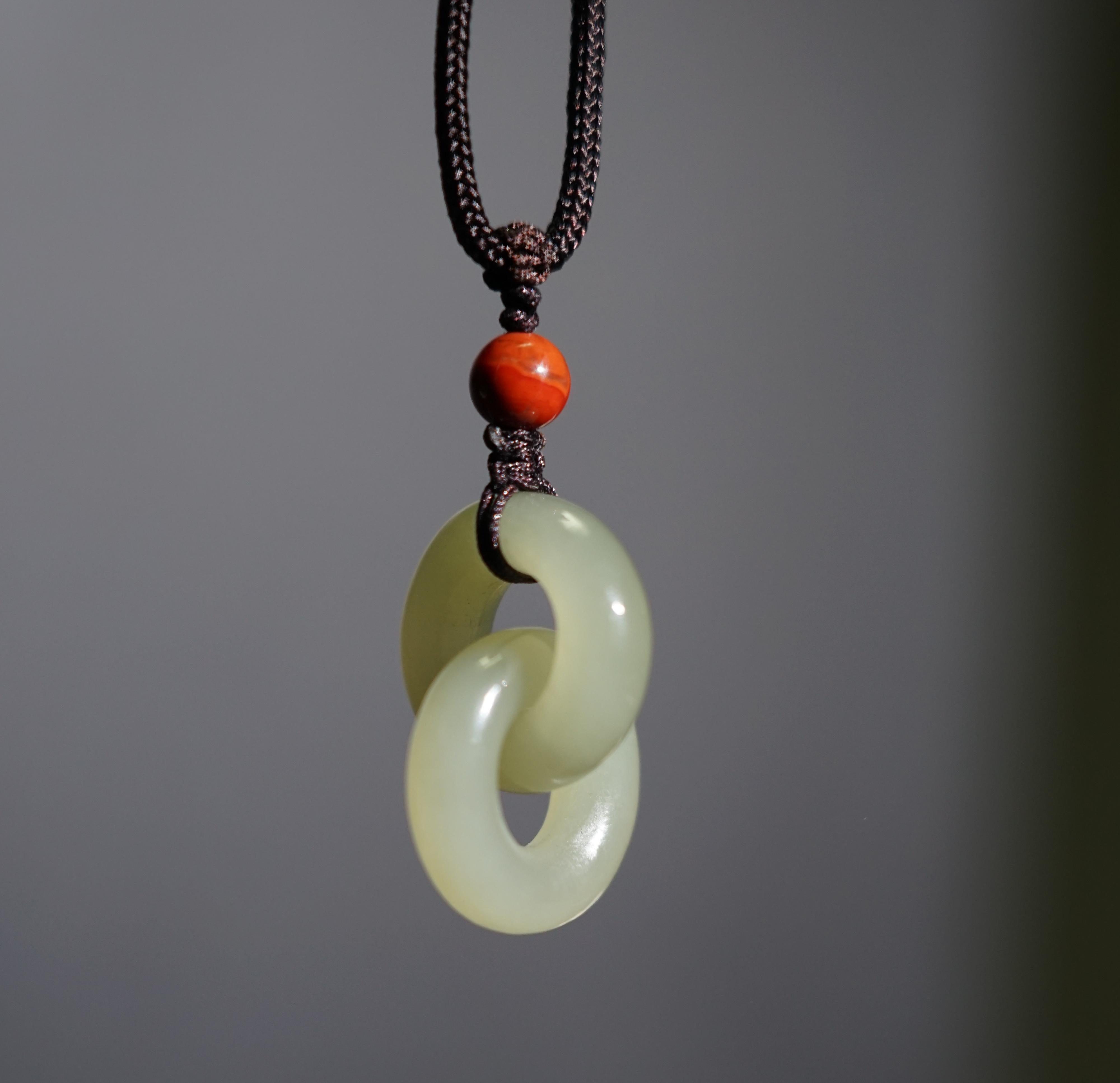 Hetian Green Jade Interlocking Concentric Knot Pendant